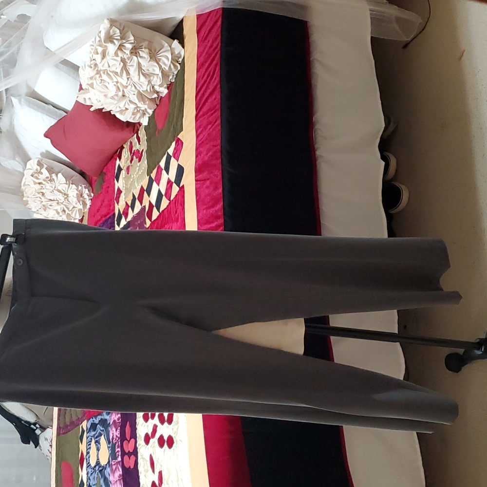 Gray slacks size 12 1 button top inside and 1 button top outside with zipper.